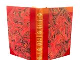 a red book that has a red cover on it