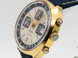 an image of a close up of a watch on a white surface