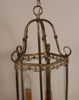 Lanterne en verre et laiton, à décor de frises de volutes et… (photo 4)