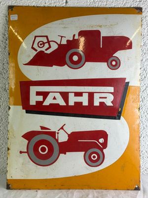 a sign with a tractor and a tractor on it