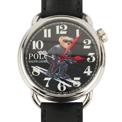 a close up of a wrist watch with a teddy bear on it