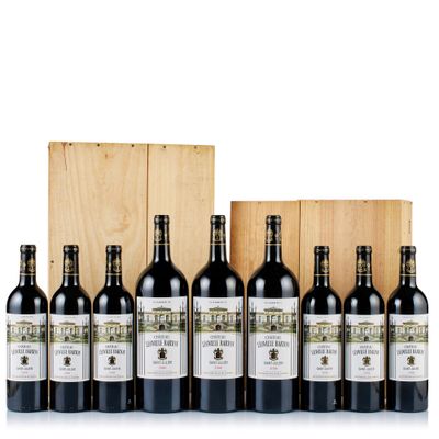 a group of bottles of wine sitting next to a wooden box