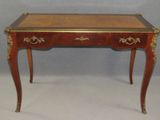 a small table with two drawers and a drawer on it