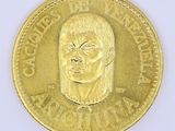an image of a gold coin with a picture of a man ' s face on it