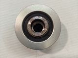 a close up of a metal object on a white surface