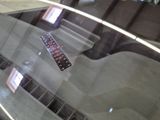 a remote control sitting on top of a glass table