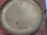 a pan that is sitting on a wooden table