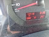 a close up of a speedometer on a car dashboard