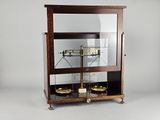 a glass display case with a scale on it