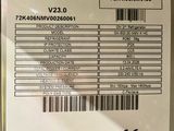 a label on the back of a machine that has a barcode on it