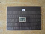 l'image d'une feuille de papier sur laquelle est apposé un timbre
