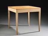an image of a small table with a wooden top on a gray surface