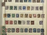 an open book with a bunch of stamps on it