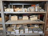 many boxes and boxes on the shelves in the room