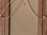 an old picture frame with a rope hanging from it ' s side