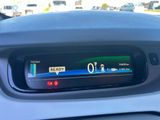 a car dashboard with a digital display on it