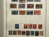 an old picture of a picture of a collection of stamps on display