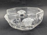 a clear glass bowl with a horse and carriage design on it