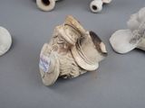 a group of vases that are sitting on a table