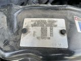 an image of a close up of a metal plate on a vehicle