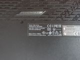 a close up of a laptop with the battery on
