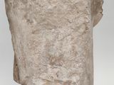 sculpture of a man ' s head on a pedestal with a white background