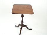 an image of a small table with a wooden top on a white background