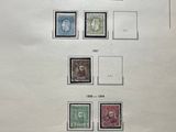 an image of a sheet of stamps with a picture of a man and woman on them
