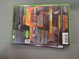 a video game on the table with a green cover
