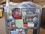a metal cart with many items in it in a warehouse