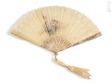 a fan with a design on it on a white background