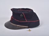 navy blue hat with red stitching and a button on the side