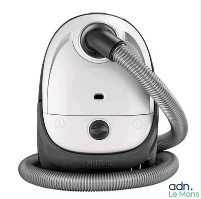 une image d'un aspirateur posé sur un support