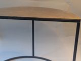 a small table with a wooden top on a white background