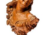 an image of a bust of a woman on a wooden base