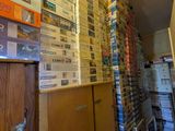 a lot of boxes stacked on top of each other in a room