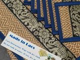 four placemats on a table with a label on them