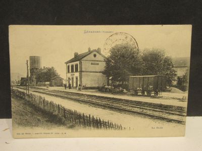 an old picture of a train on the tracks in the country