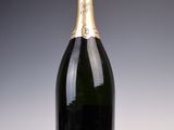 an image of a bottle of champagne on a white surface