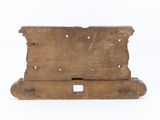 a small wooden box with holes on it