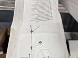 a cardboard box with a drawing on it sitting on a table