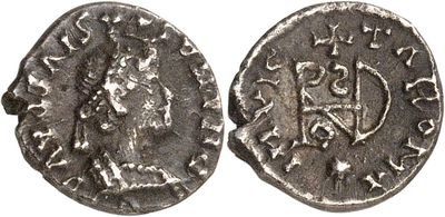 a silver coin with an image of a woman and a man on it