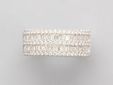 a white gold ring with baguets of diamonds