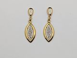 a pair of gold and diamond earrings