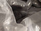 a close up of a bag of food on a table