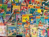 a lot of cartoon books on the floor together
