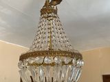 a chandelier hanging from the ceiling in a room