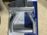 a box with a piece of metal in it