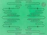 un gros plan sur une feuille de papier verte parsemée de points