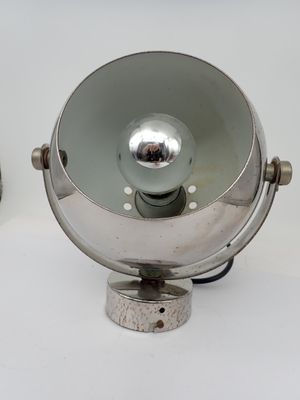 two lamps that are sitting on a white surface